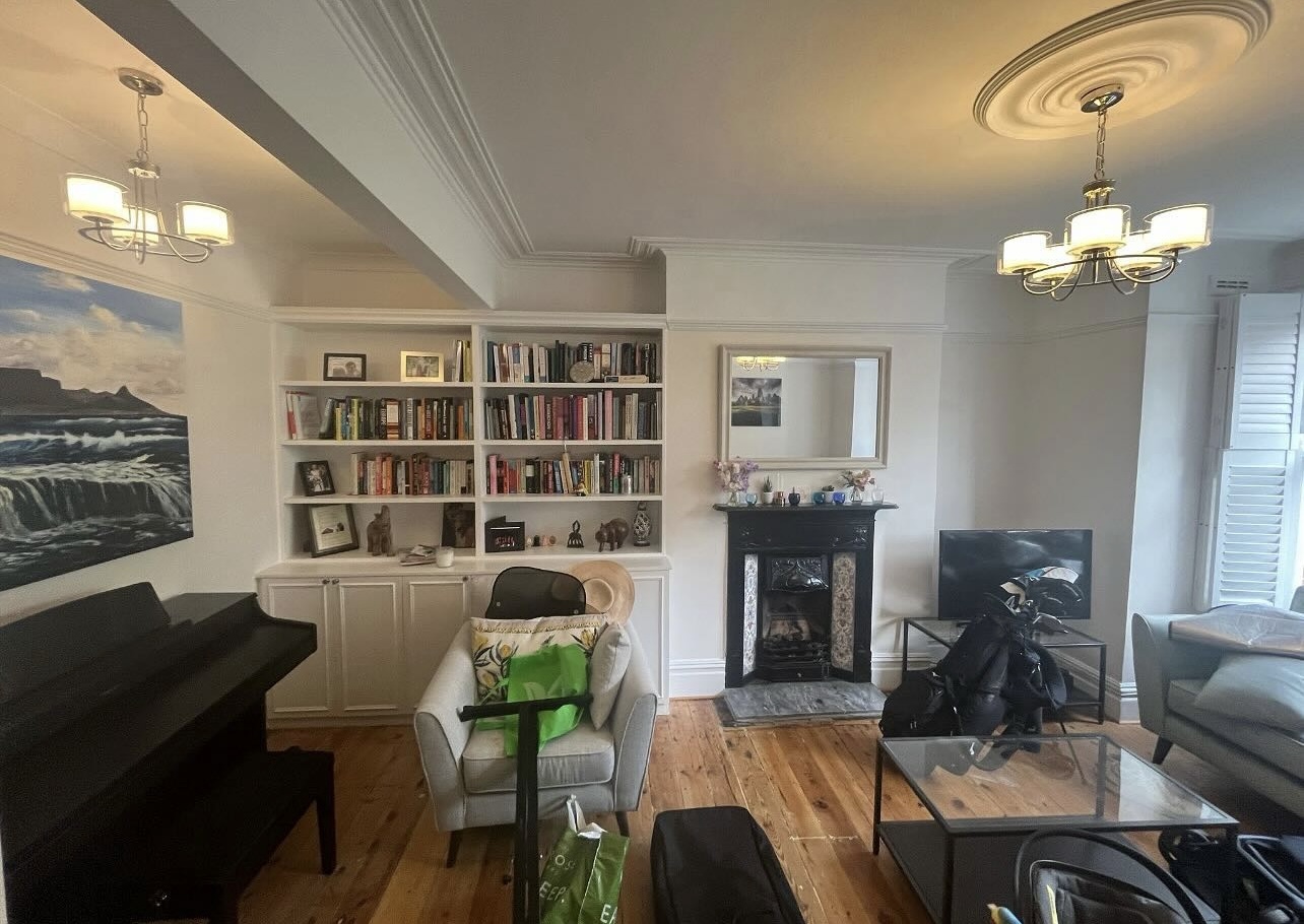 Completed living room electrical installation in a Surrey home